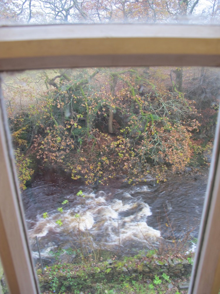 full height window looking over the river